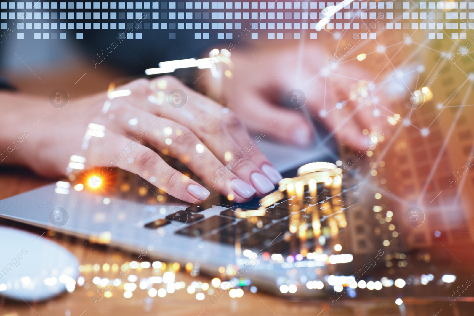 Image of Woman working on modern laptop and night cityscape, closeup. Double exposure