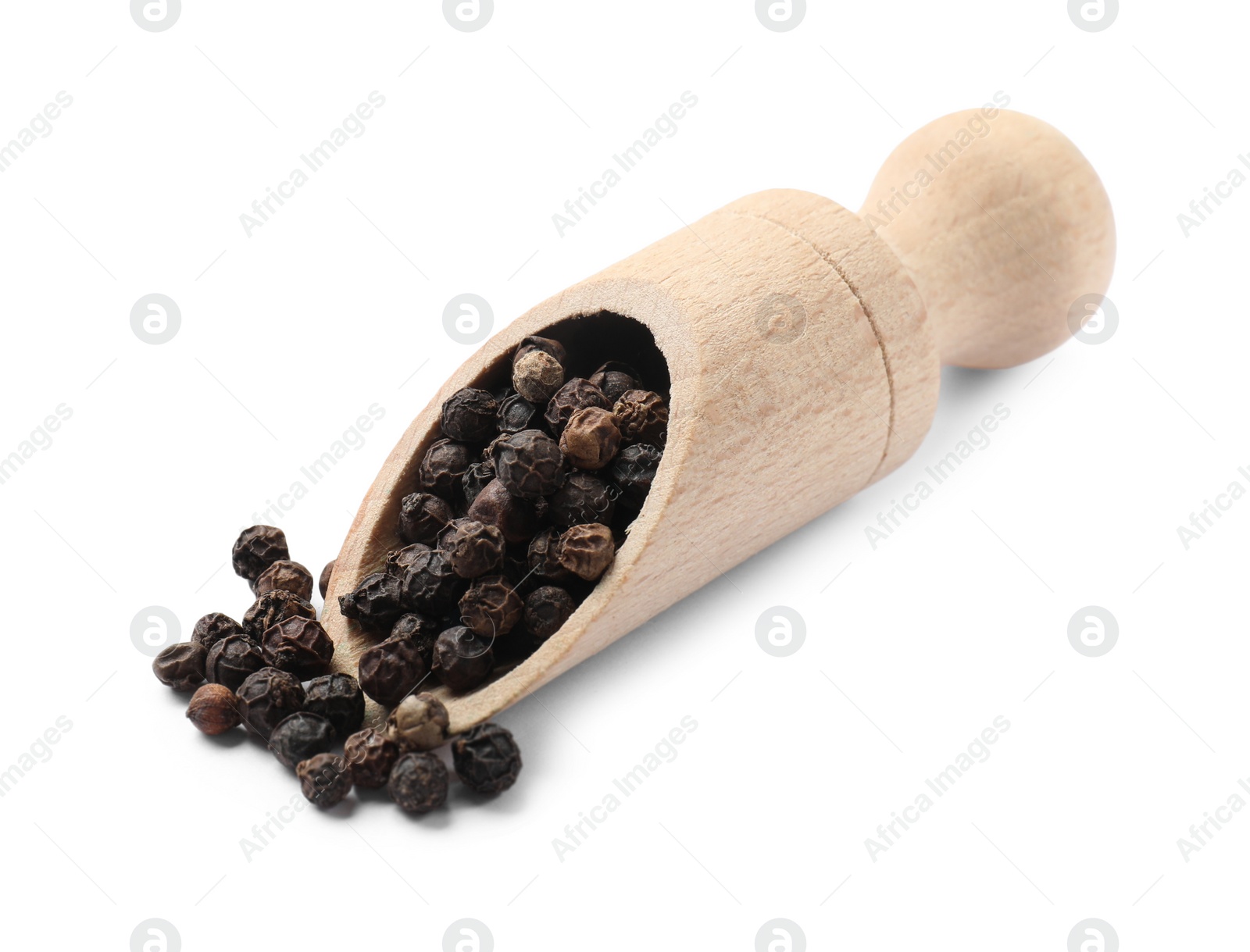 Photo of Aromatic spice. Many black peppercorns in scoop isolated on white