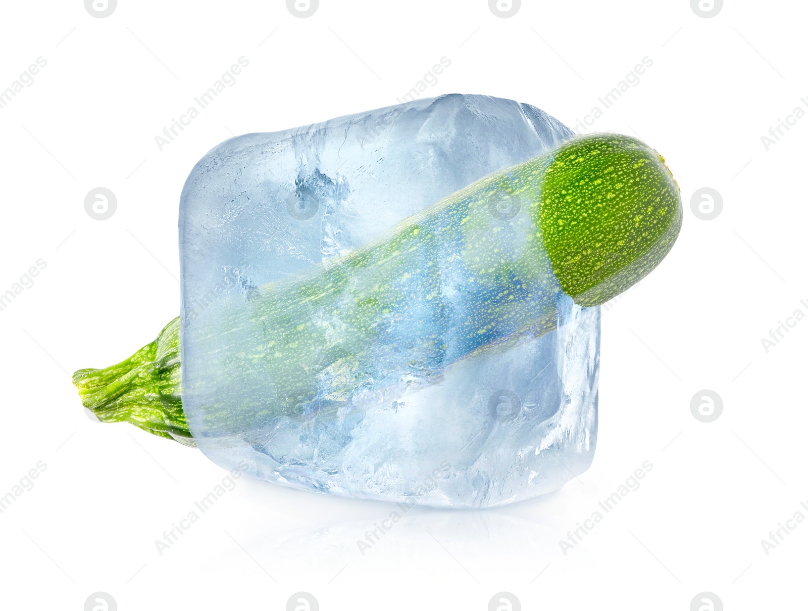 Image of Frozen food. Raw zucchini in ice cube isolated on white