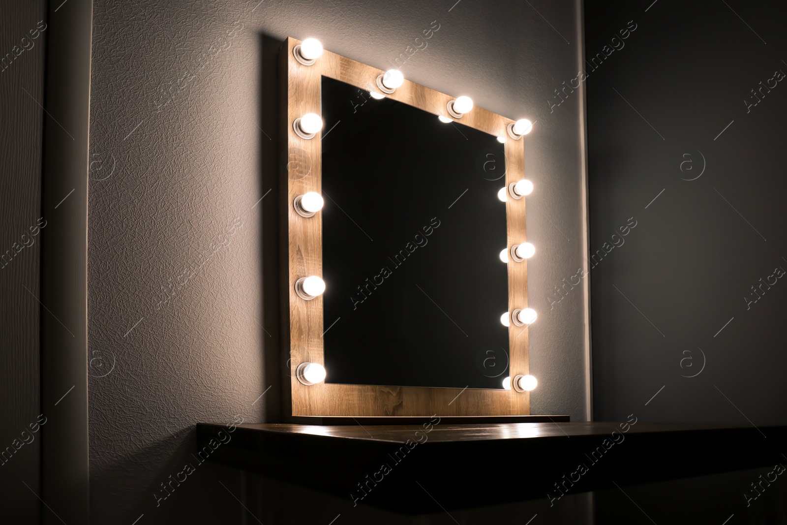 Photo of Beautiful mirror in modern makeup room