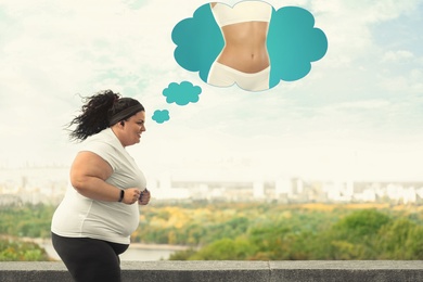 Motivated overweight woman dreaming about slim body while running outdoors. Weight loss concept