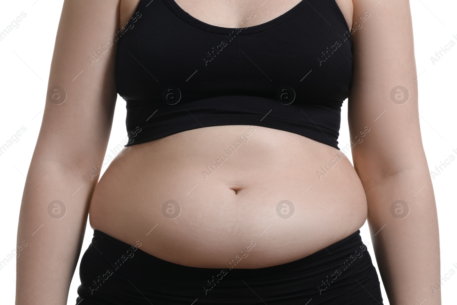 Photo of Woman with excessive belly fat on white background, closeup. Overweight problem