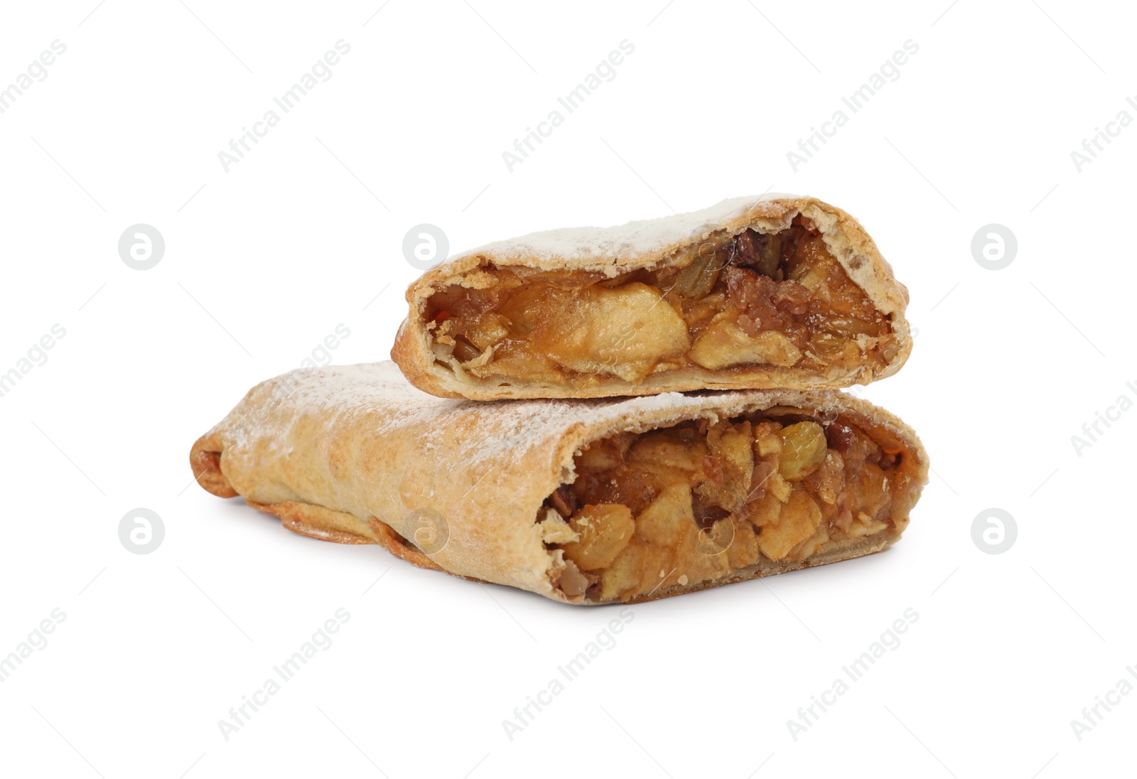 Photo of Delicious cut strudel with apples, nuts and raisins isolated on white