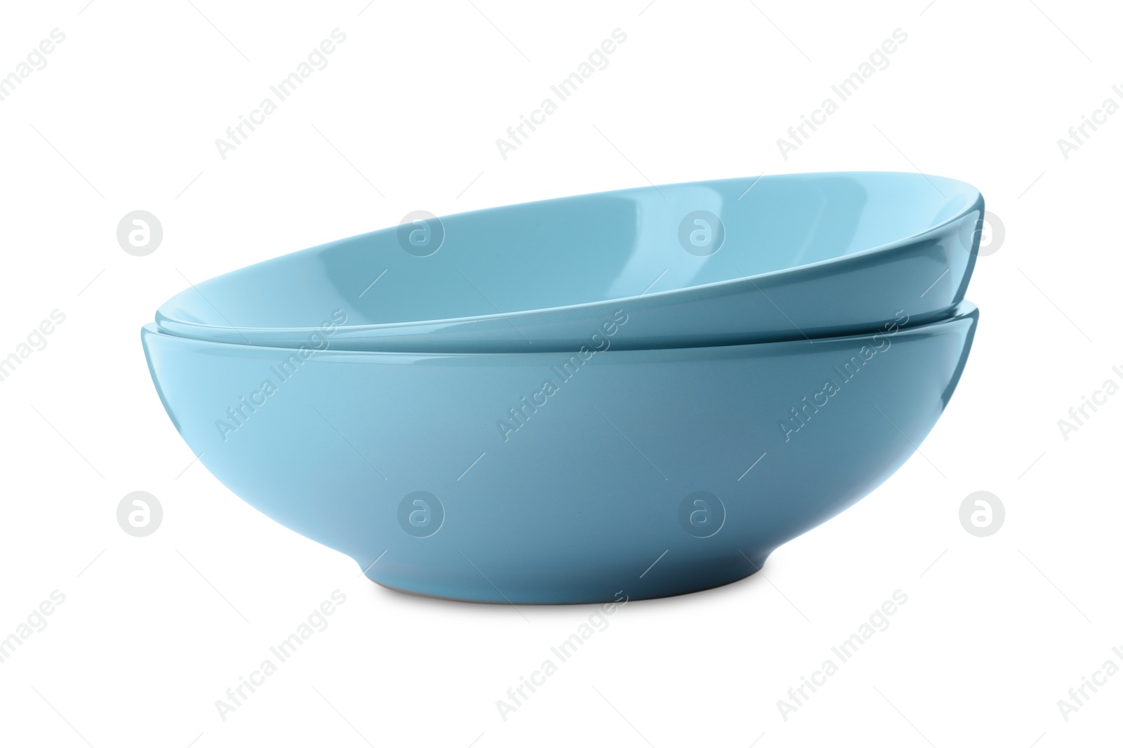 Photo of Clean empty ceramic bowls on white background