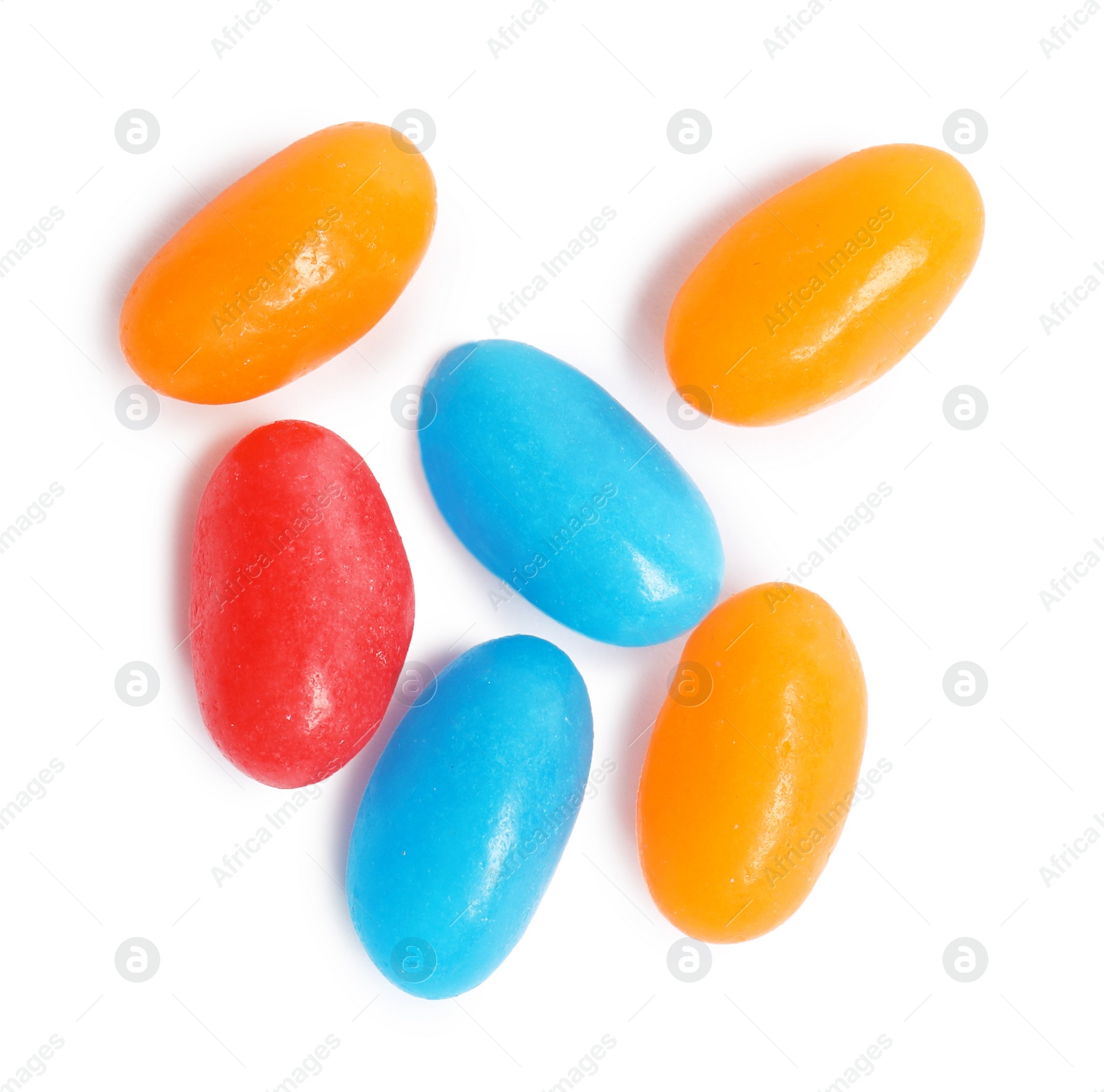 Photo of Delicious colorful jelly beans isolated on white, top view