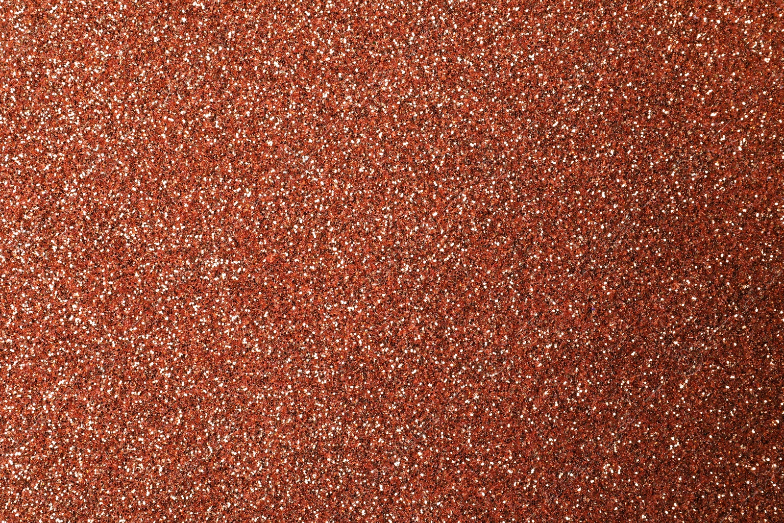 Photo of Beautiful shiny copper glitter as background, closeup