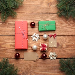 Flat lay composition with Christmas decorations on wooden background. Winter season