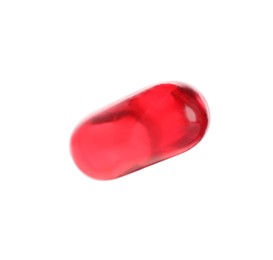 Photo of One red pill isolated on white. Medicinal treatment