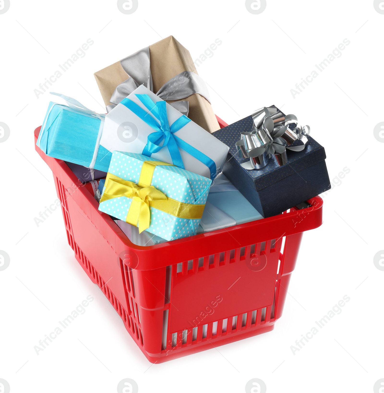 Photo of Red shopping basket with different gifts on white background