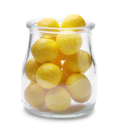 Photo of Tasty small lemon drops in glass jar isolated on white