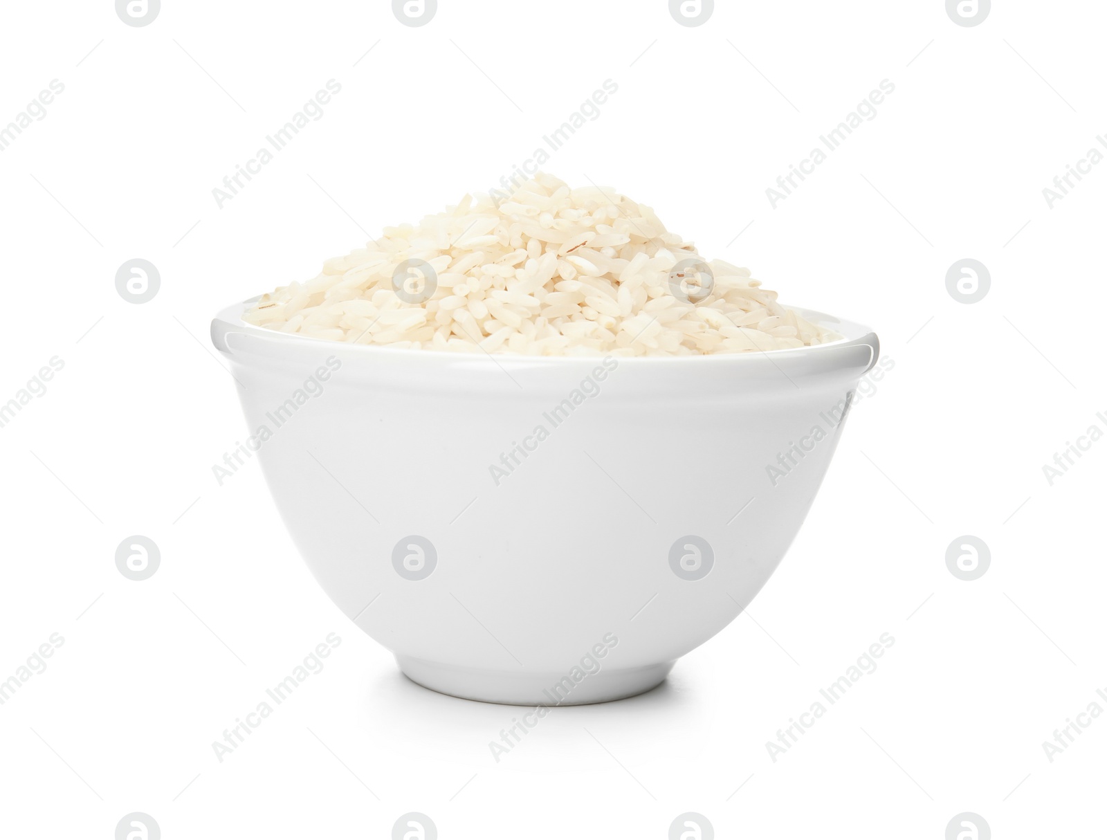 Photo of Bowl with uncooked rice on white background