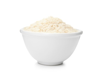 Photo of Bowl with uncooked rice on white background