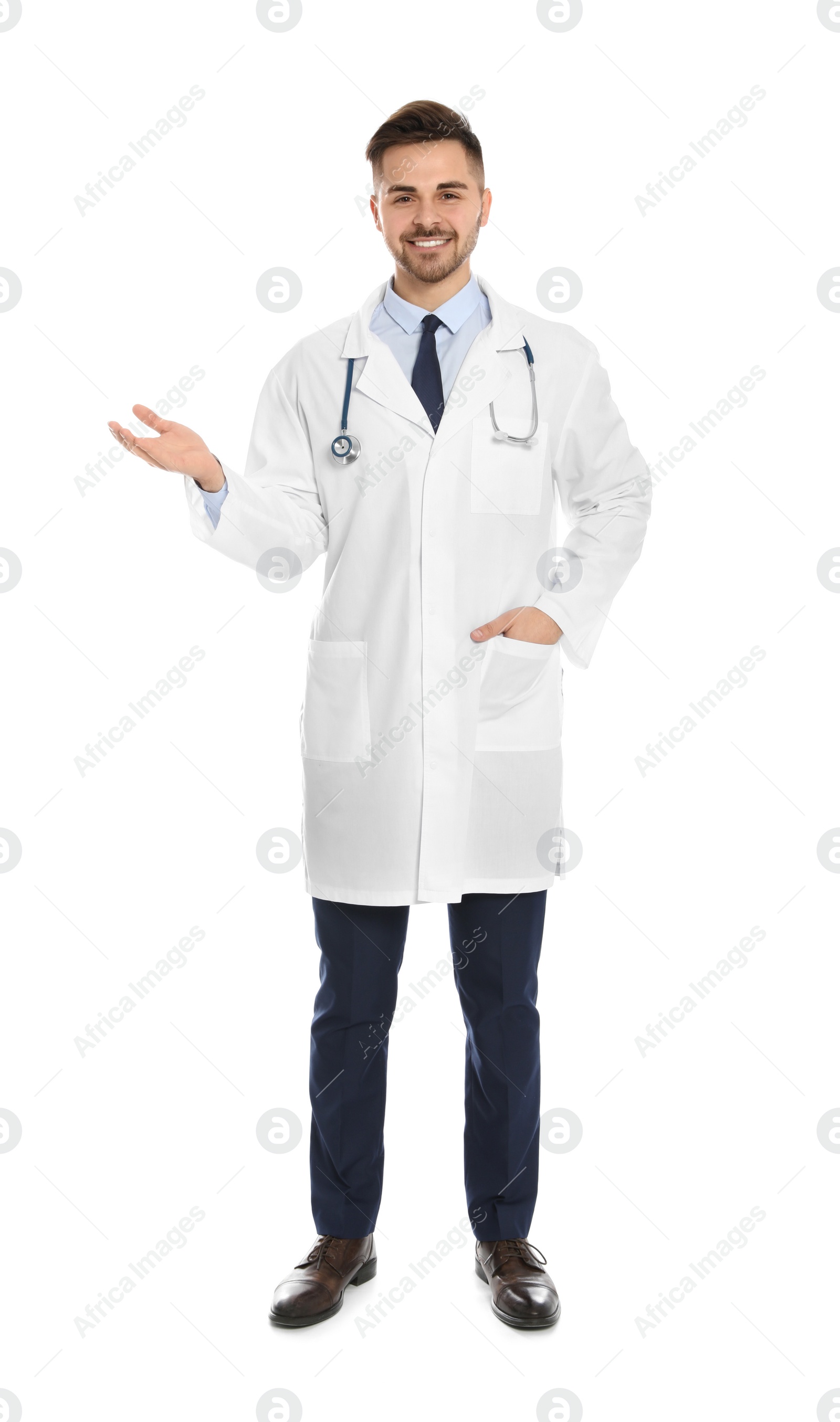 Photo of Full length portrait of medical doctor with stethoscope isolated on white