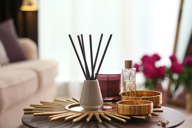 Composition with stylish accessories and interior elements on table indoors