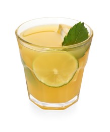 Photo of Glass of tasty pineapple cocktail with mint and lime isolated on white
