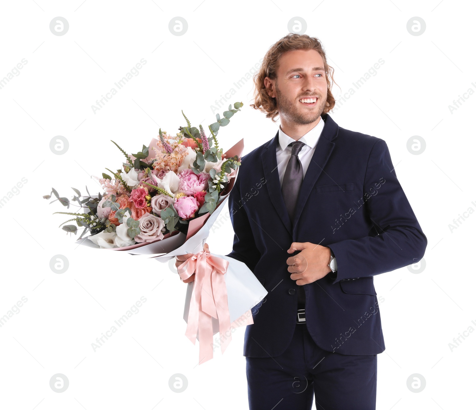 Photo of Young handsome man in stylish suit with beautiful flower bouquet on white background
