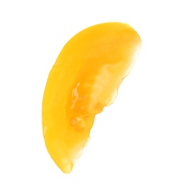 Photo of Slice of yellow tomato on white background