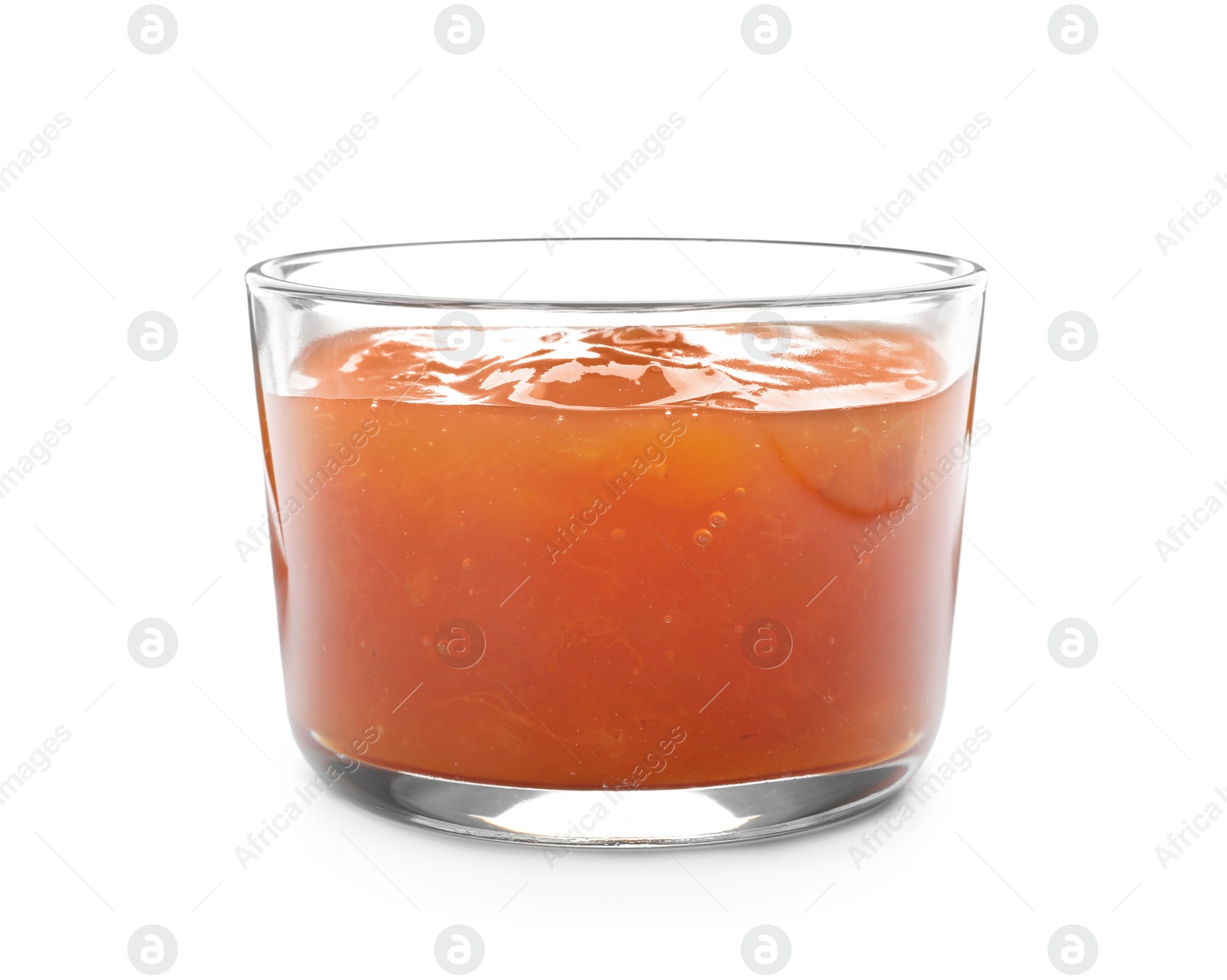 Photo of Glass with delicious apricot jam on white background