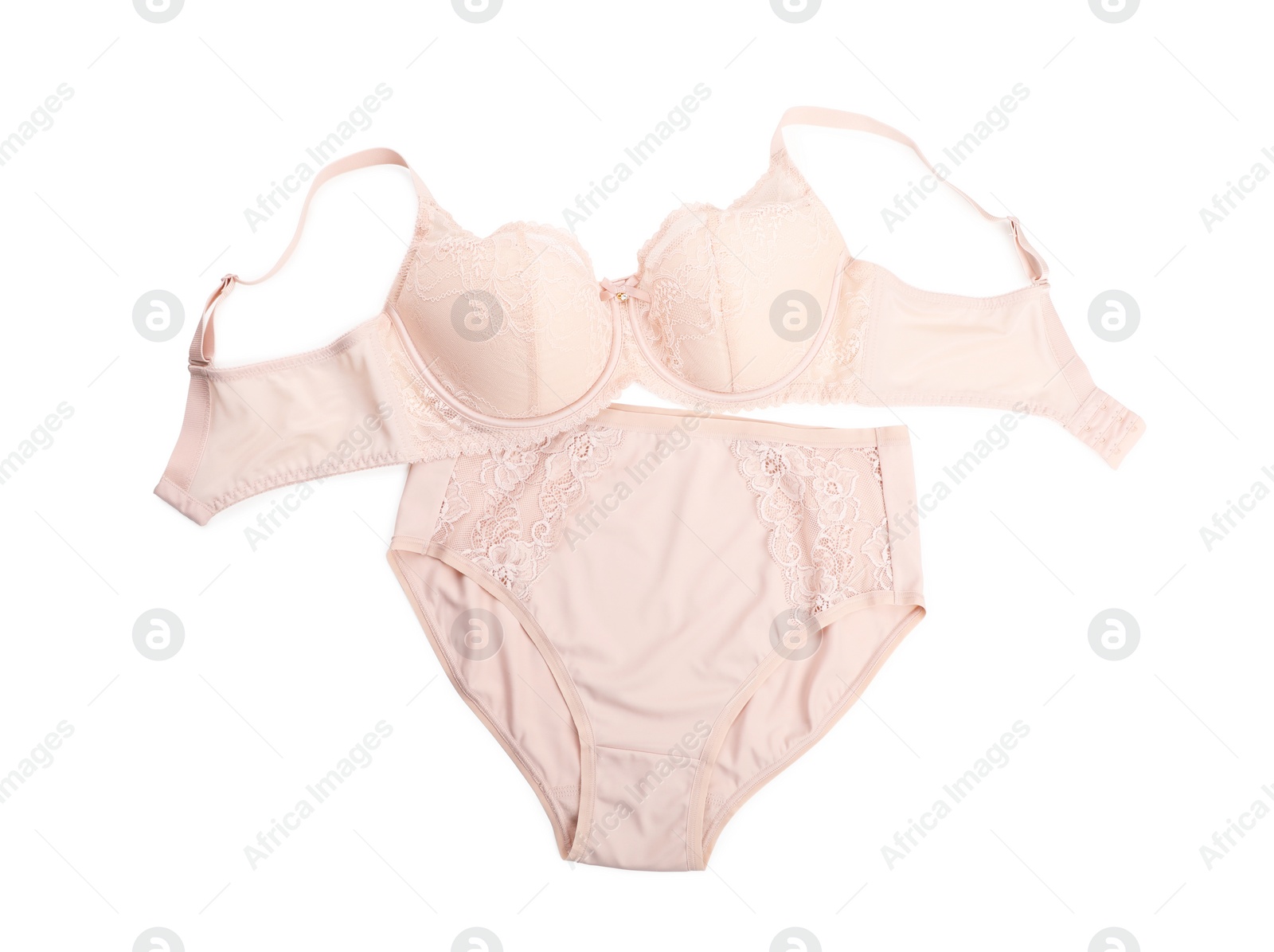 Photo of Elegant beige plus size women's underwear on white background, top view