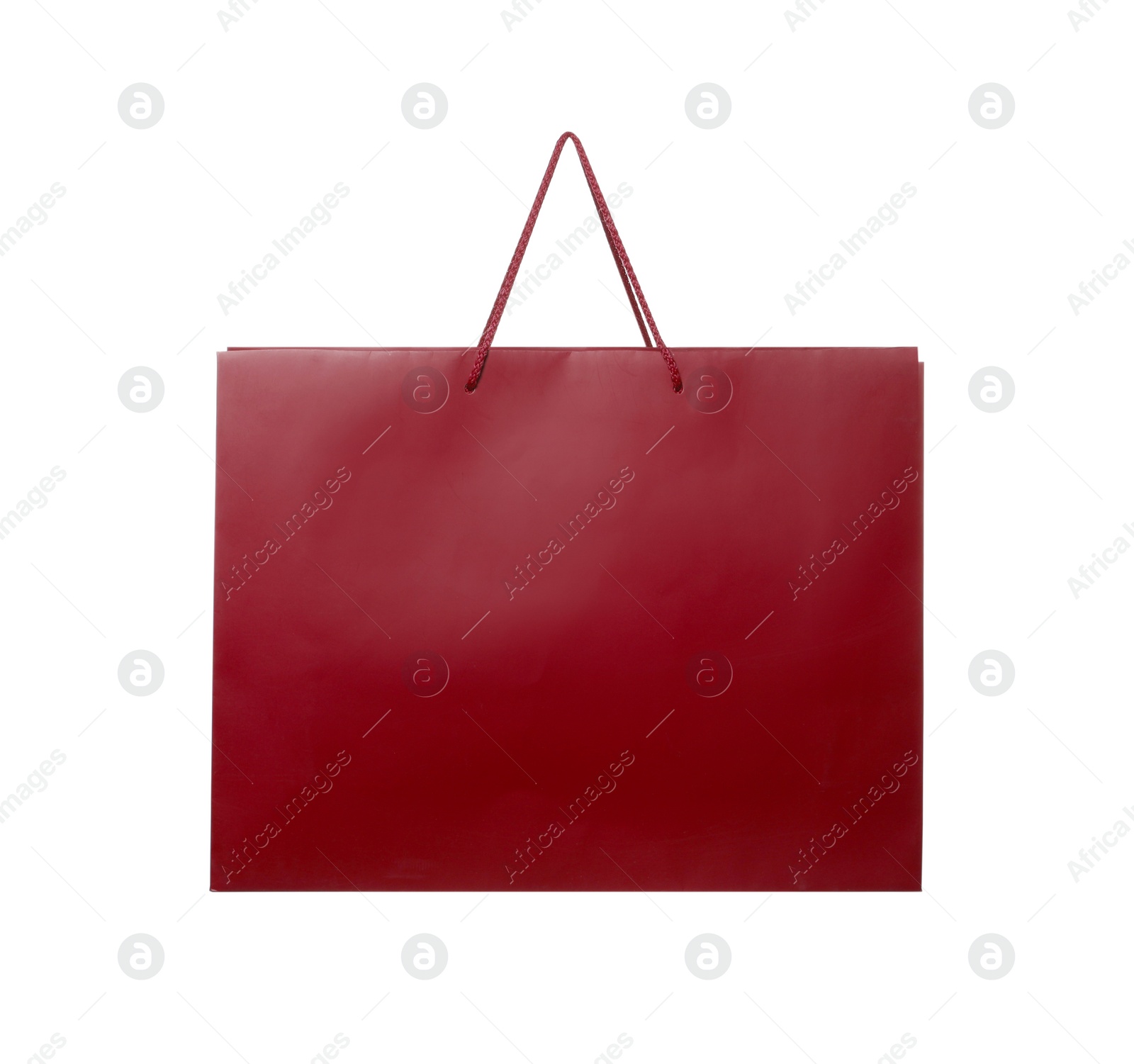 Photo of One dark red shopping bag isolated on white