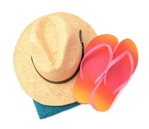 Photo of Straw hat, towel and flip flops isolated on white, top view. Beach objects