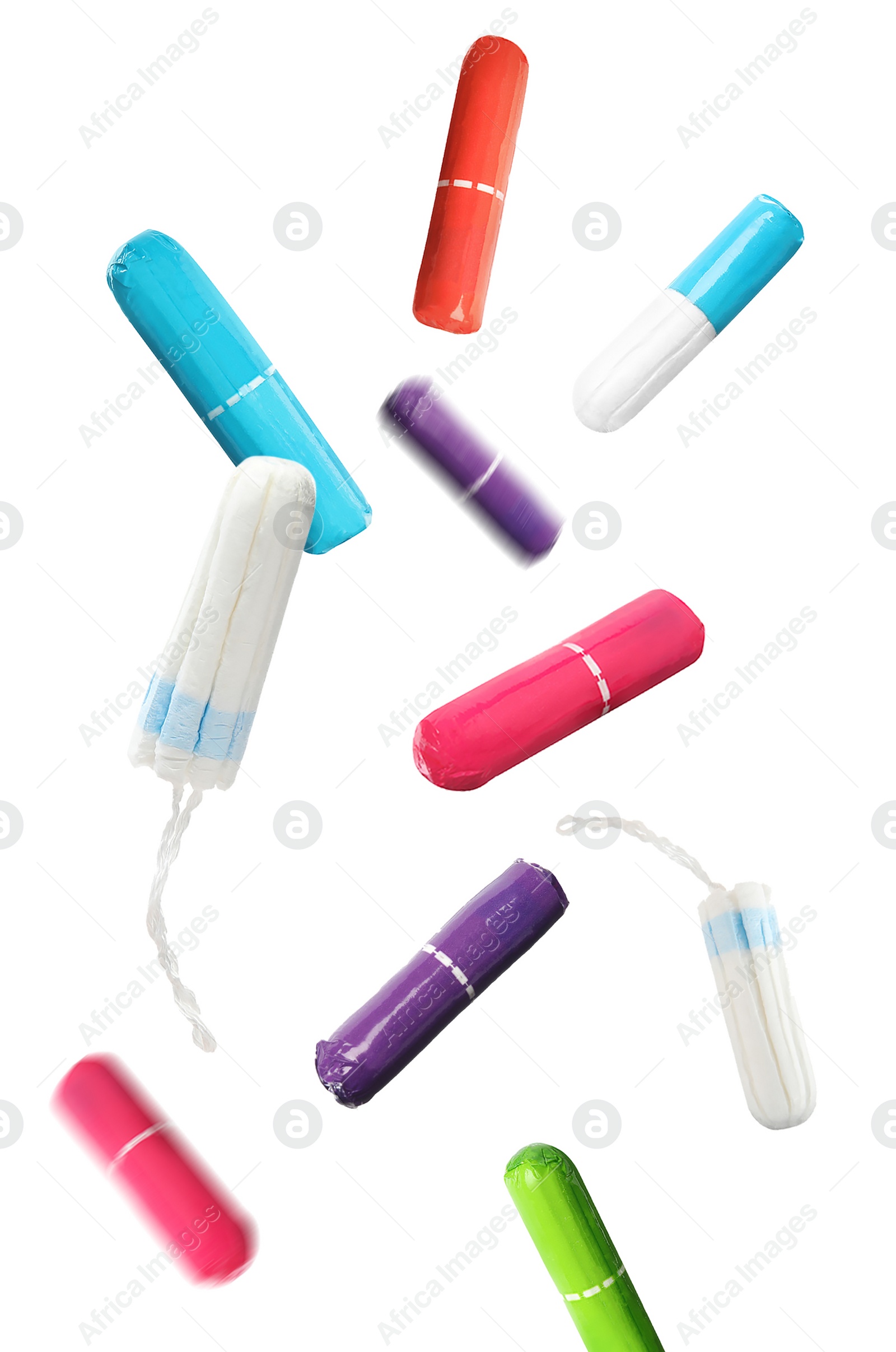 Image of Many tampons falling on white background. Menstrual hygienic product