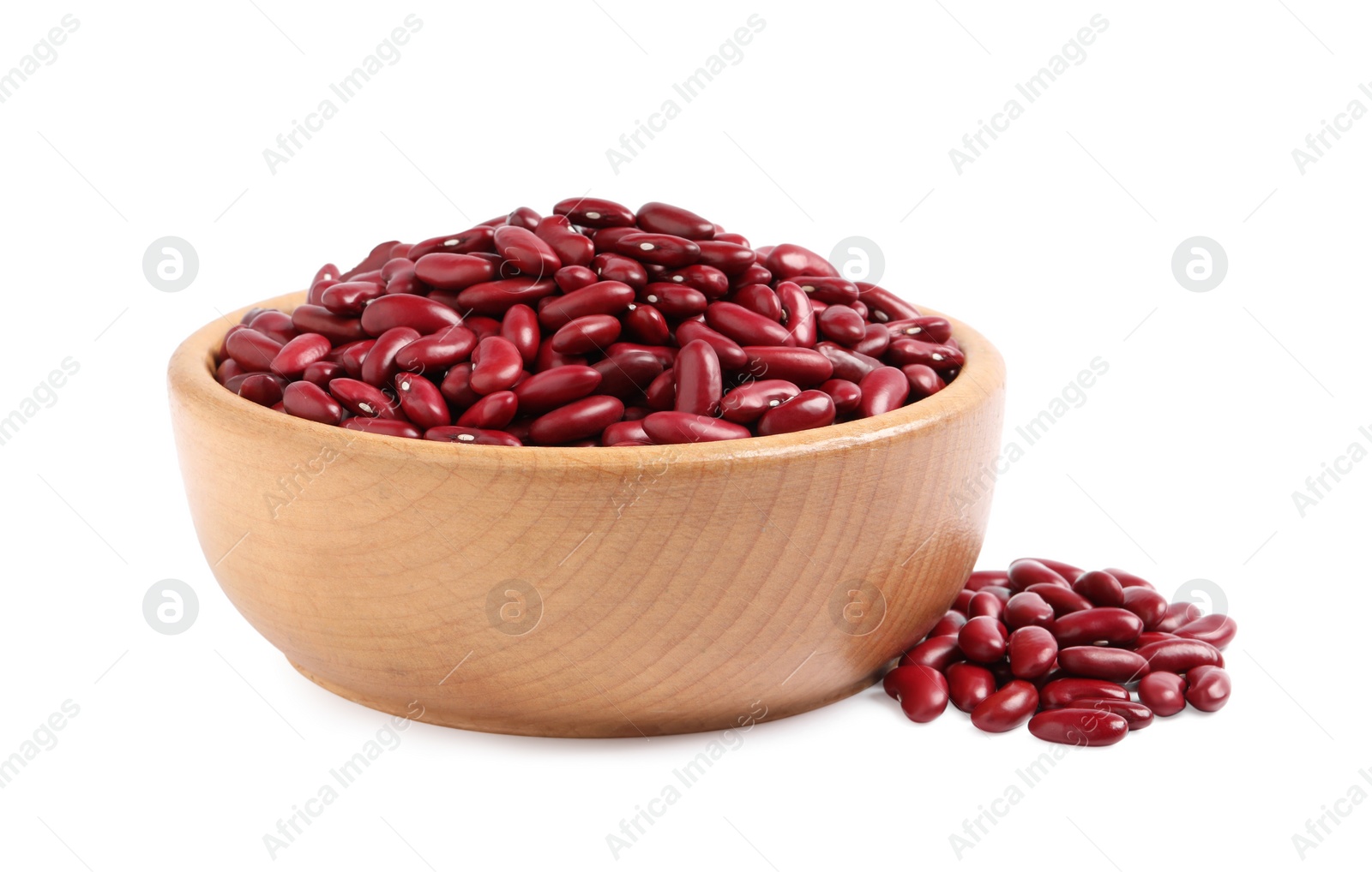 Photo of Raw red kidney beans and wooden bowl isolated on white