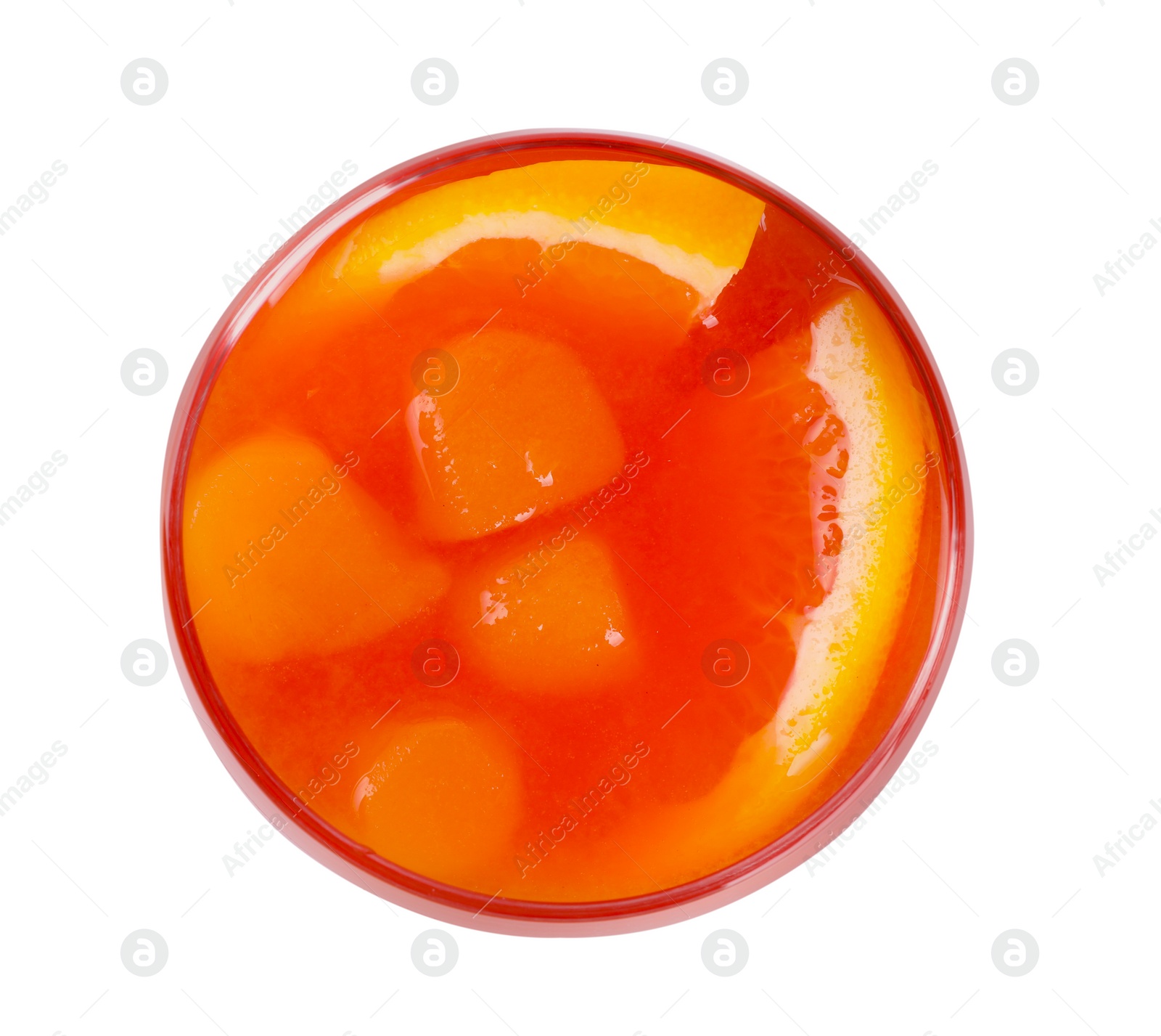 Photo of Aperol spritz cocktail and orange slices in glass isolated on white, top view