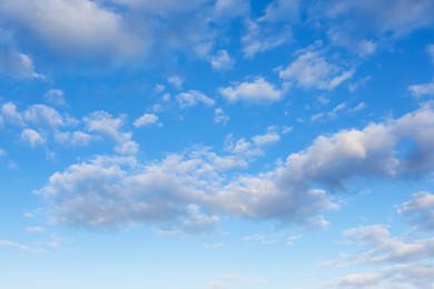 Photo of Picturesque view of beautiful fluffy clouds in light blue sky