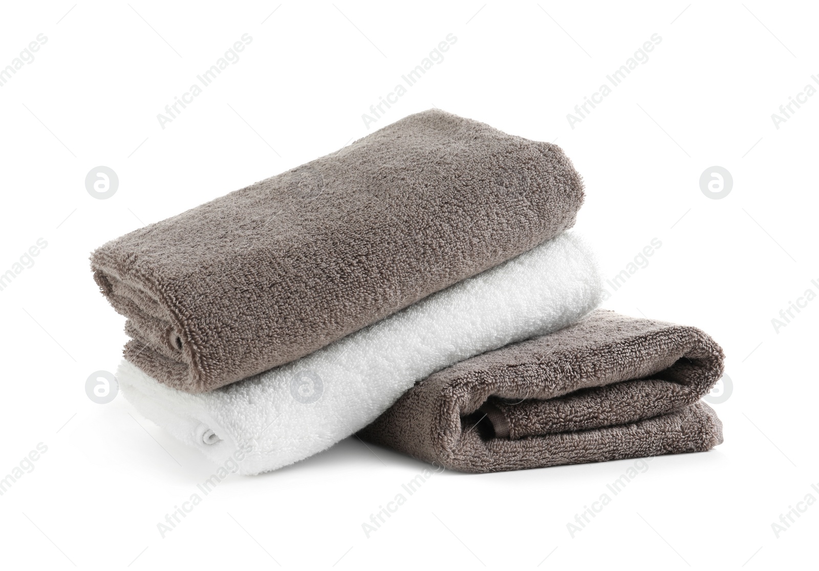 Photo of Stack of fresh towels isolated on white