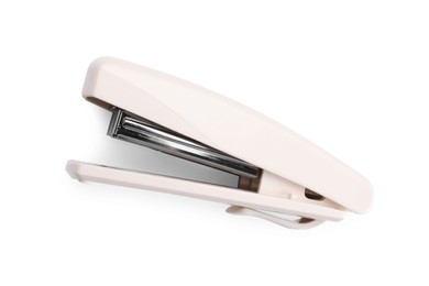 Photo of One beige stapler isolated on white, top view