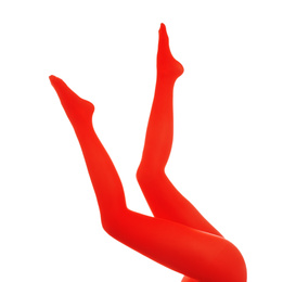 Photo of Woman wearing red tights on white background, closeup of legs