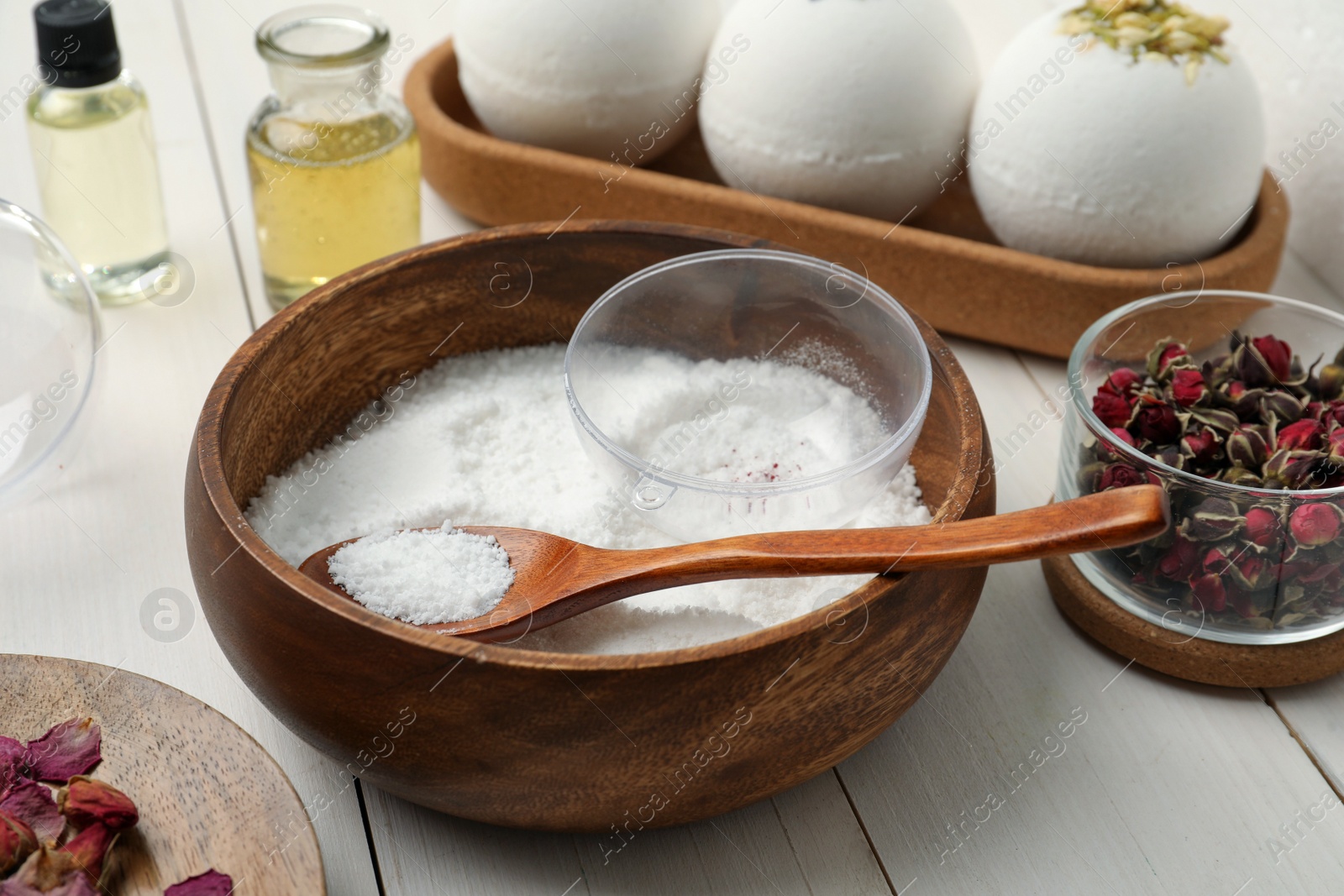 Photo of Composition with bath bomb ingredients on white wooden table