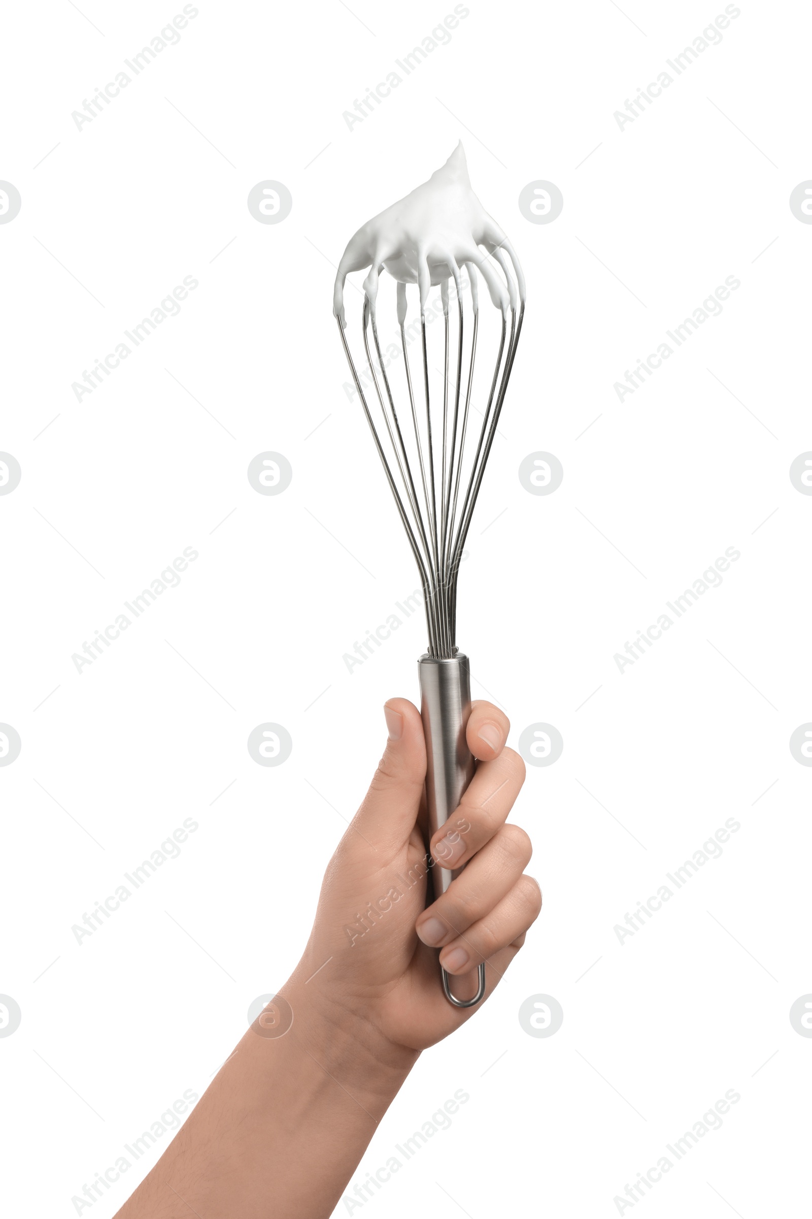 Photo of Woman holding whisk with whipped cream on white background, closeup