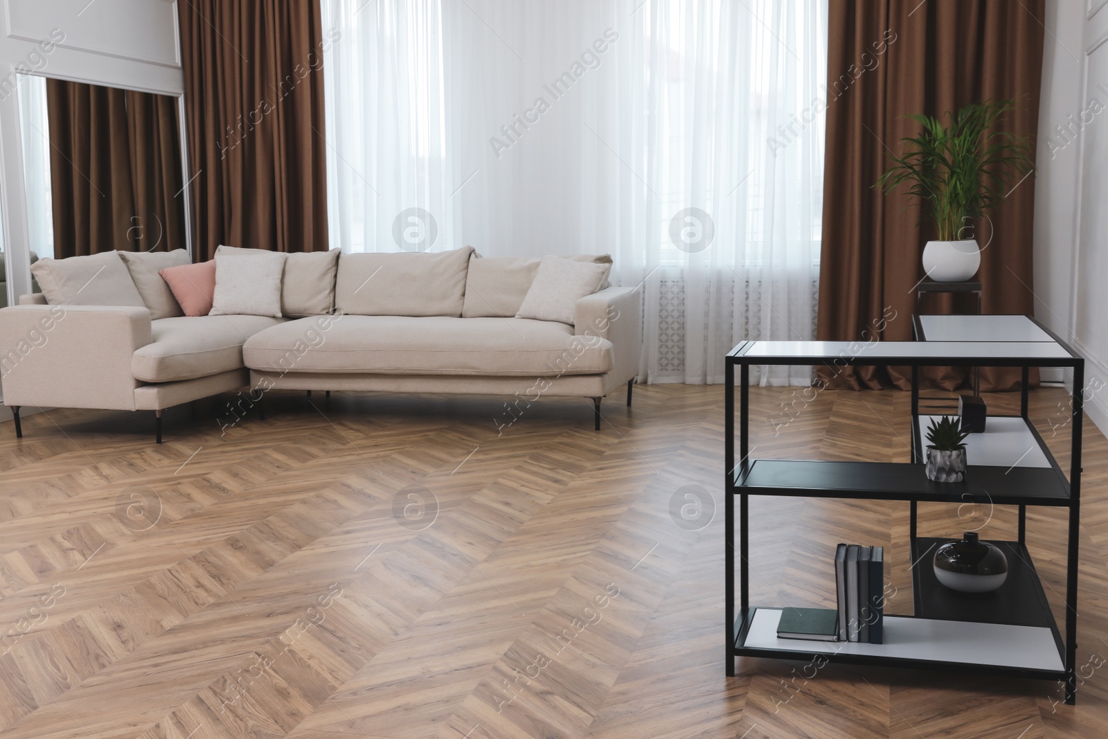 Photo of Modern living room with parquet flooring and stylish furniture