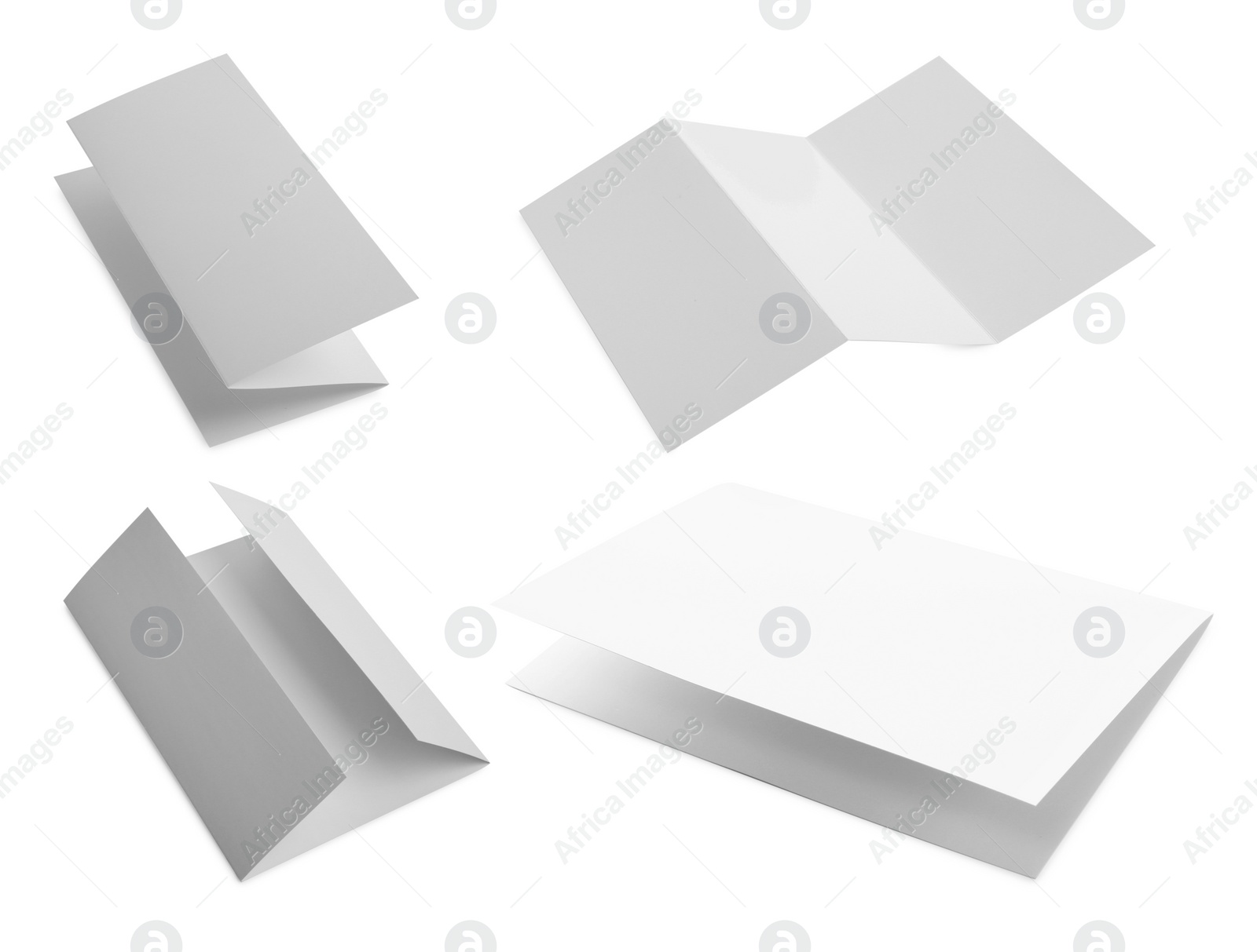 Image of Set with blank paper brochures on white background. Mockup for design