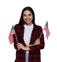 Image of 4th of July - Independence day of America. Happy young woman holding national flags of United States on white background