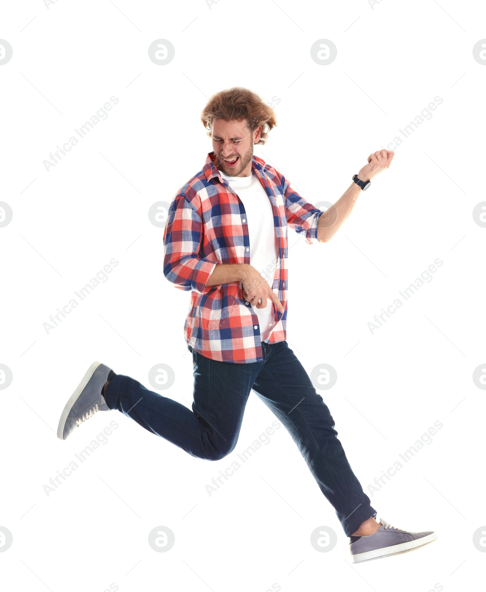 Photo of Young man playing air guitar on white background