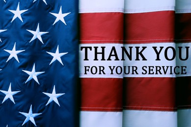 Image of American flag as background and text THANK YOU FOR YOUR SERVICE, top view. Memorial day