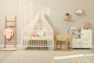 Cozy baby room with crib and other furniture. Interior design