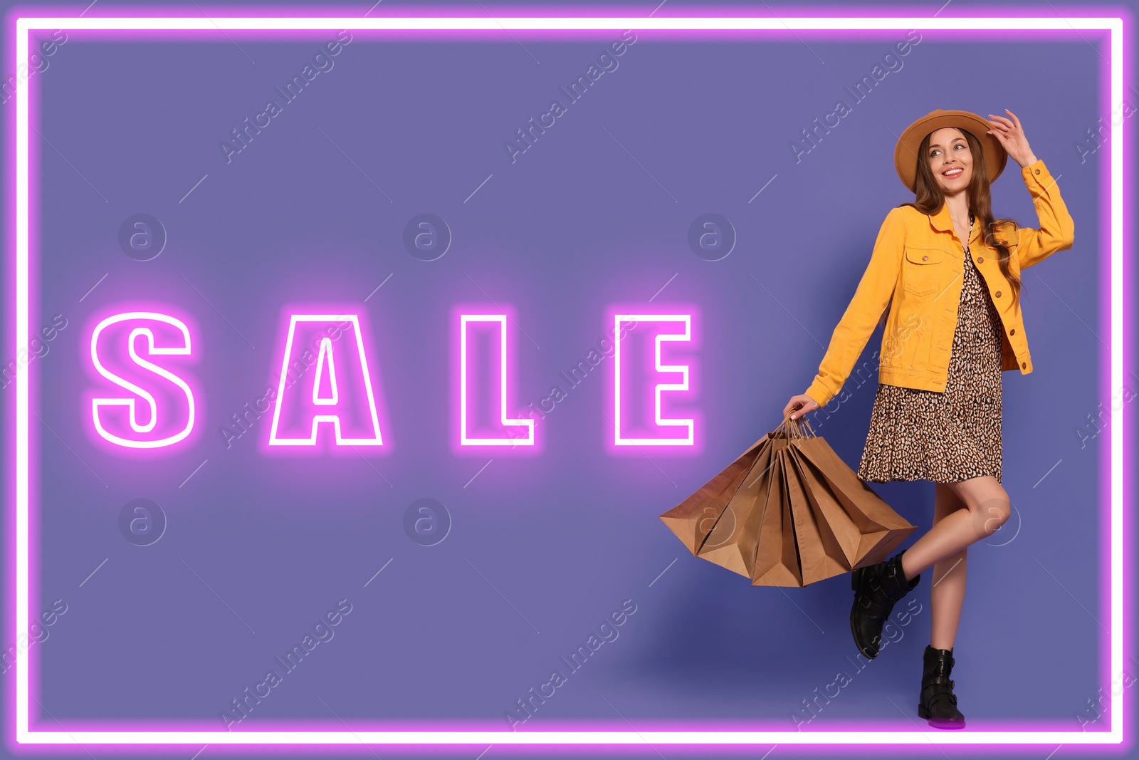 Image of Stylish young woman with shopping bags, neon frame and word Sale on violet background