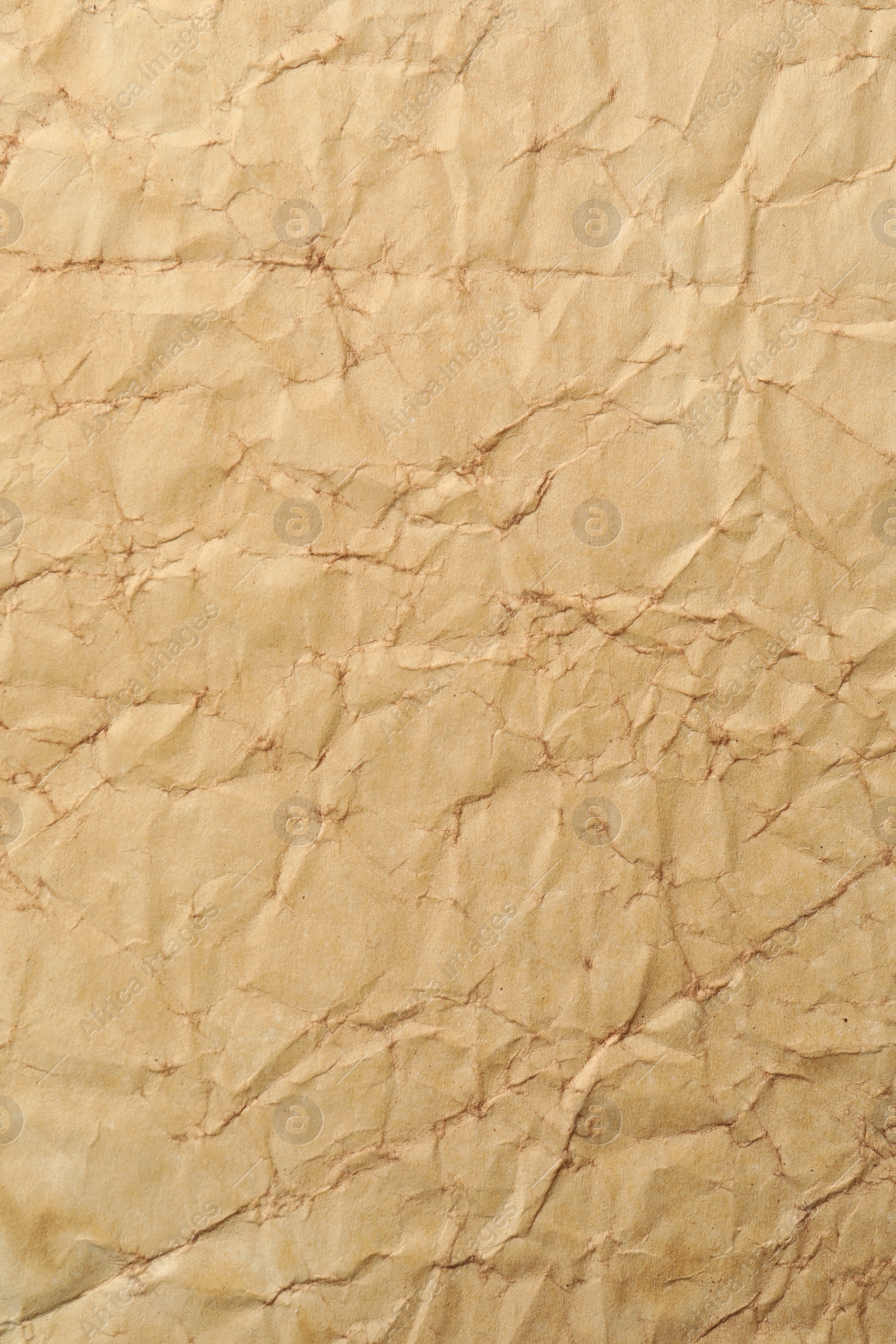 Photo of Texture of crumpled old paper as background, top view
