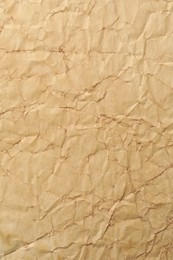 Texture of crumpled old paper as background, top view