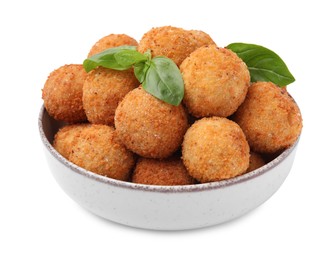 Bowl with delicious fried tofu balls and basil on white background