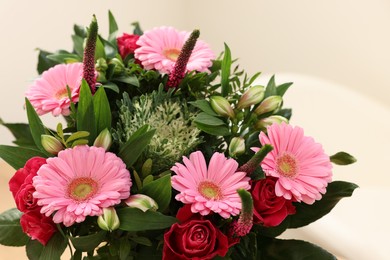 Photo of Bouquet of beautiful flowers on light background, closeup