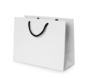 Photo of Paper shopping bag isolated on white. Mock up for design