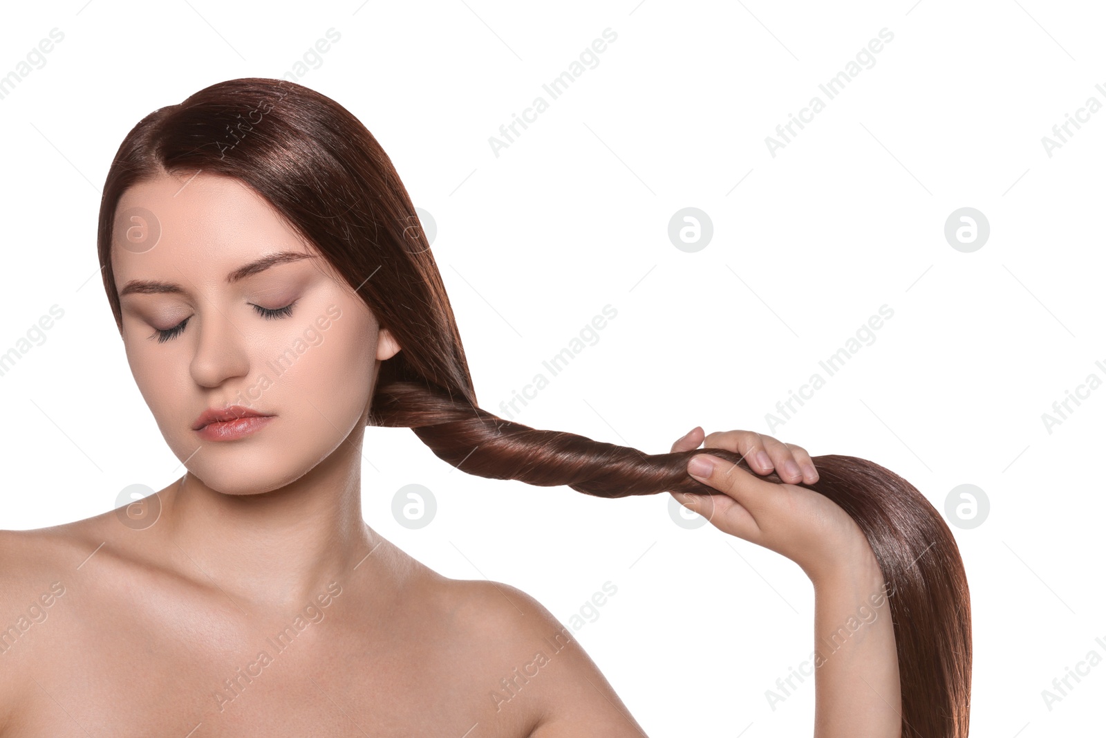 Photo of Portrait of beautiful young woman with healthy strong hair on white background