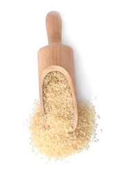 Photo of Scoop with uncooked parboiled rice on white background, top view