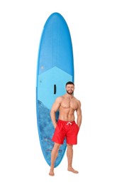 Happy man with blue SUP board on white background
