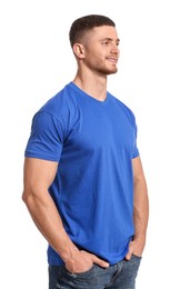 Photo of Man wearing blue t-shirt on white background. Mockup for design